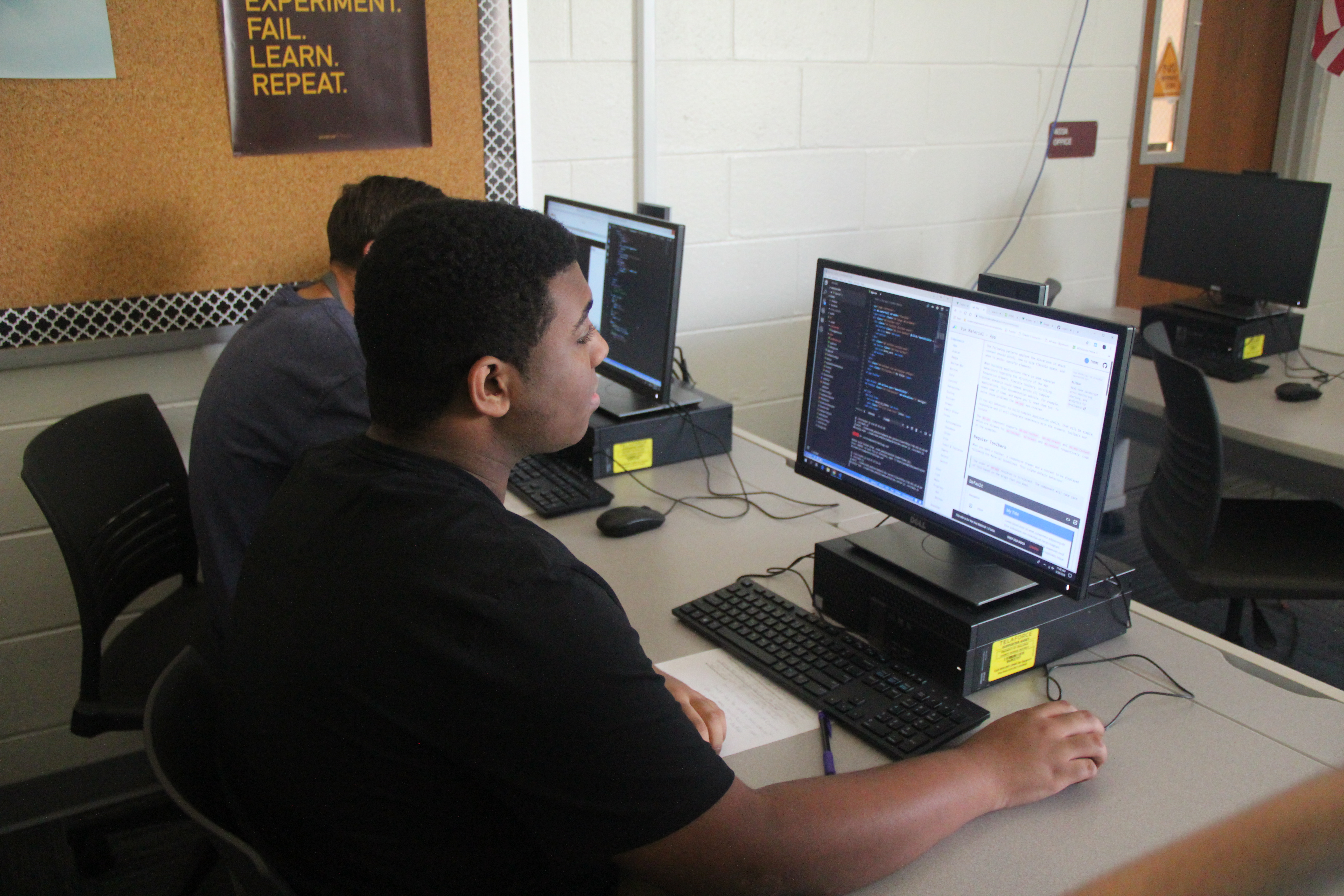 Niceville High web students coding on computer