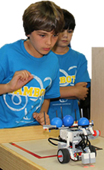 students observing moving robot 